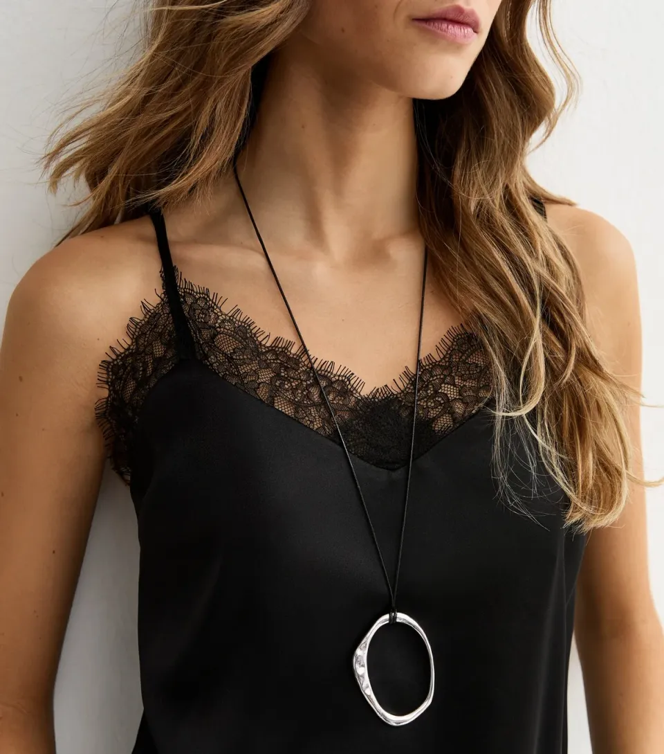 Silver Tone Oval Pendant Rope Necklace