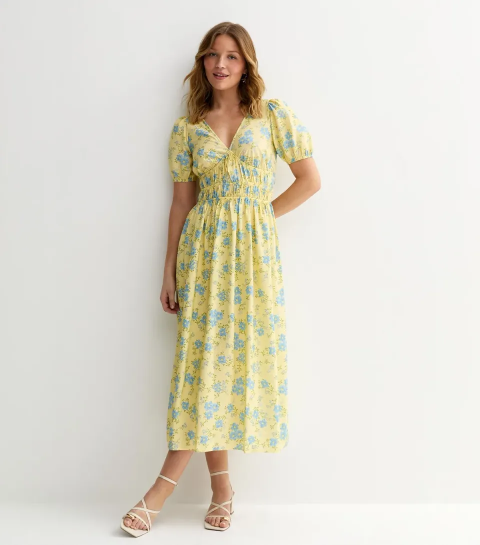 Women's Yellow Crepe Ditsy Print Tiered Hem Midi Dress