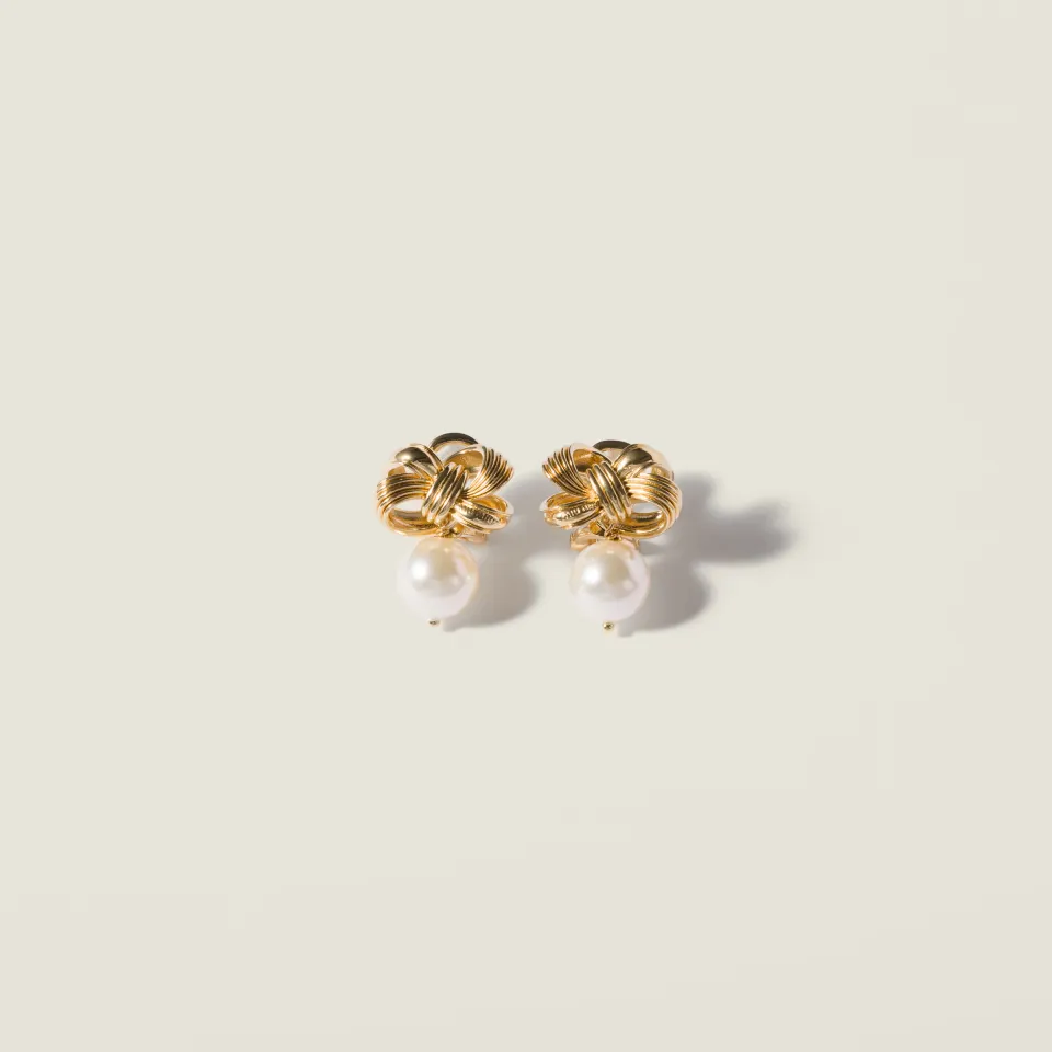 Metal and pearl earrings