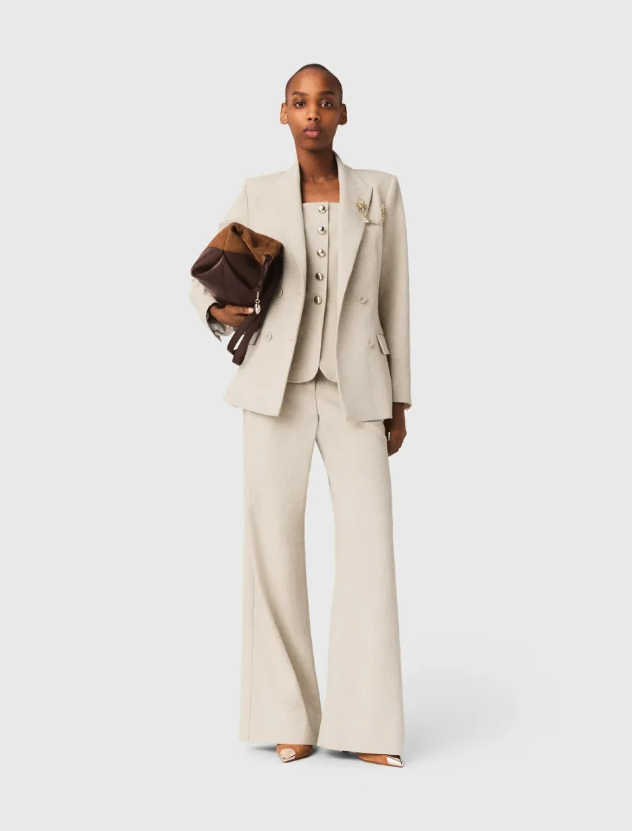 Suit jacket with brooch