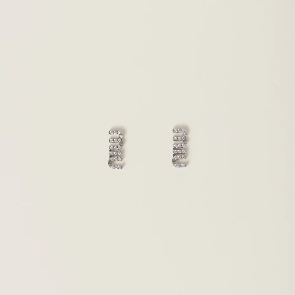 Metal earrings with crystals