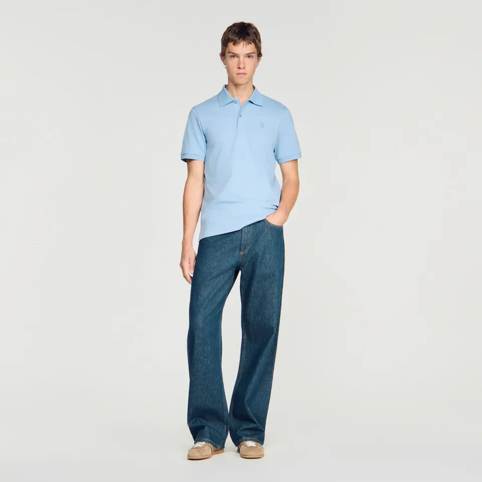 Cotton polo shirt with leather logo