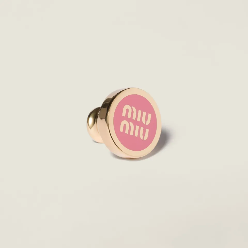 Enameled metal logo brooch