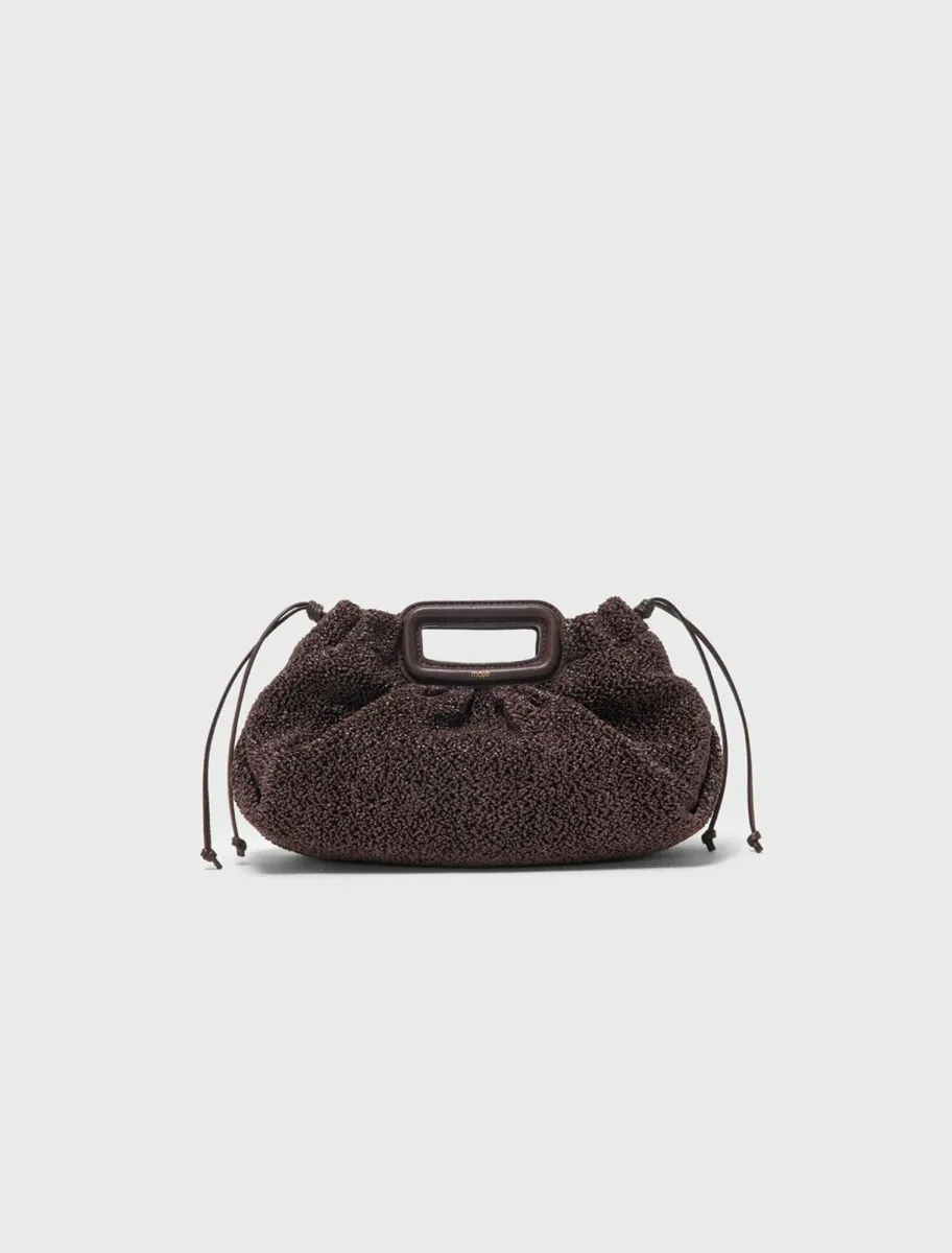 Mipli bouclé effect clutch bag