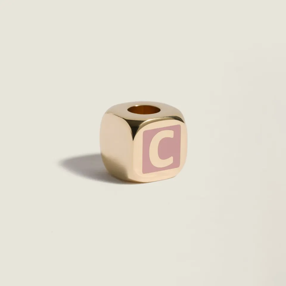 Enameled metal dice charm