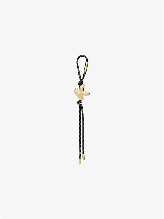 Initial Gold-Tone and Speckled Cord Bag Charm