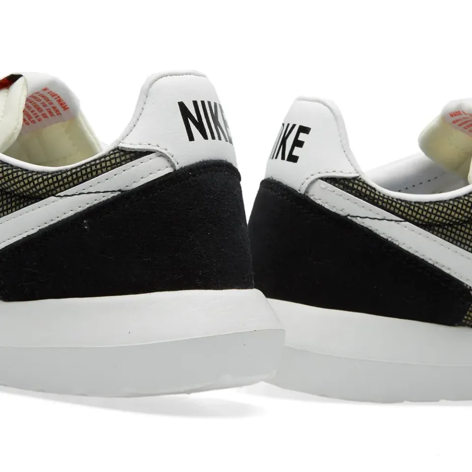 Roshe Daybreak NM
