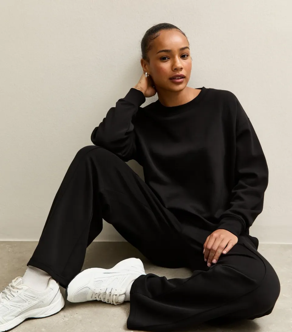 Women's Petite Premium Black Oversized Crew Neck Sweatshirt