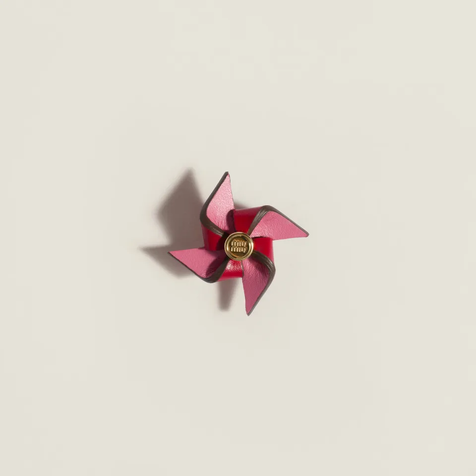 Leather pinwheel brooch