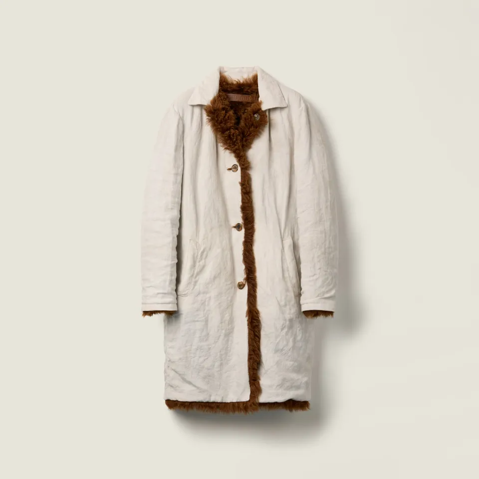 Reversible single-breasted linen and shearling coat
